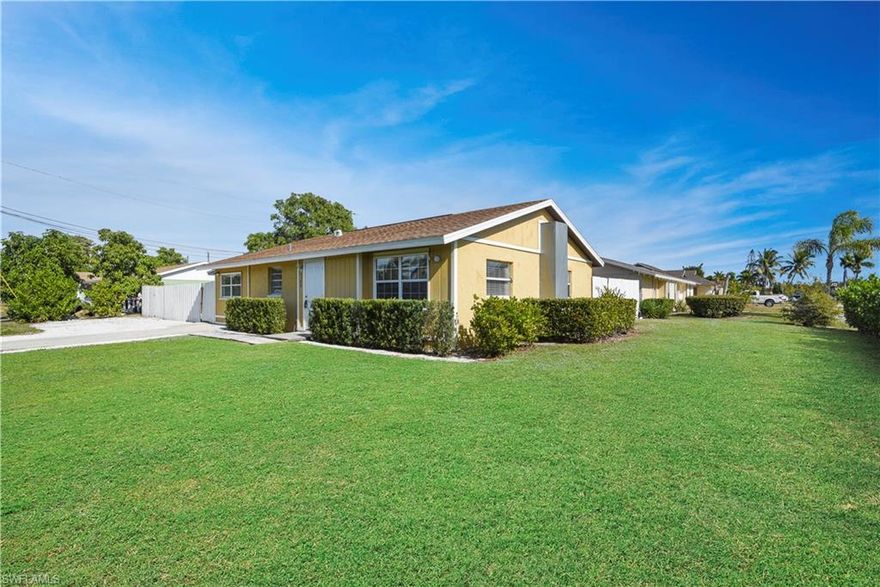 Hard to find 3 Bedroom 3 Bath at this price are hard to come by. This This unique corner lot property will not last long. It has a 1/1 apartment and the main residence is a large 2/2. Live in the 2/2 and rent out the attached apartment! The large fenced in yard also boasts a shed with ample storage space. Naples Twin Lakes has an unbeatable location, no HOA fees, or restrictions! Fenced in area on the side yard is perfect for parking your boat.