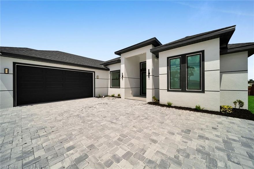Located in a prime area of Cape Coral in Gleason Parkway, this beautifully designed home offers 1,949 sq ft of living area with 4 bedrooms and 4 bathrooms. The interior features tile flooring throughout and luxury finishes, creating a modern and elegant living space. The open floor plan provides comfortable living and entertaining areas, while the freshwater canal location offers peaceful water views and added privacy. Conveniently located close to shopping, dining, and everyday amenities. Great opportunity to own a stylish waterfront home in a highly desirable Cape Coral location.