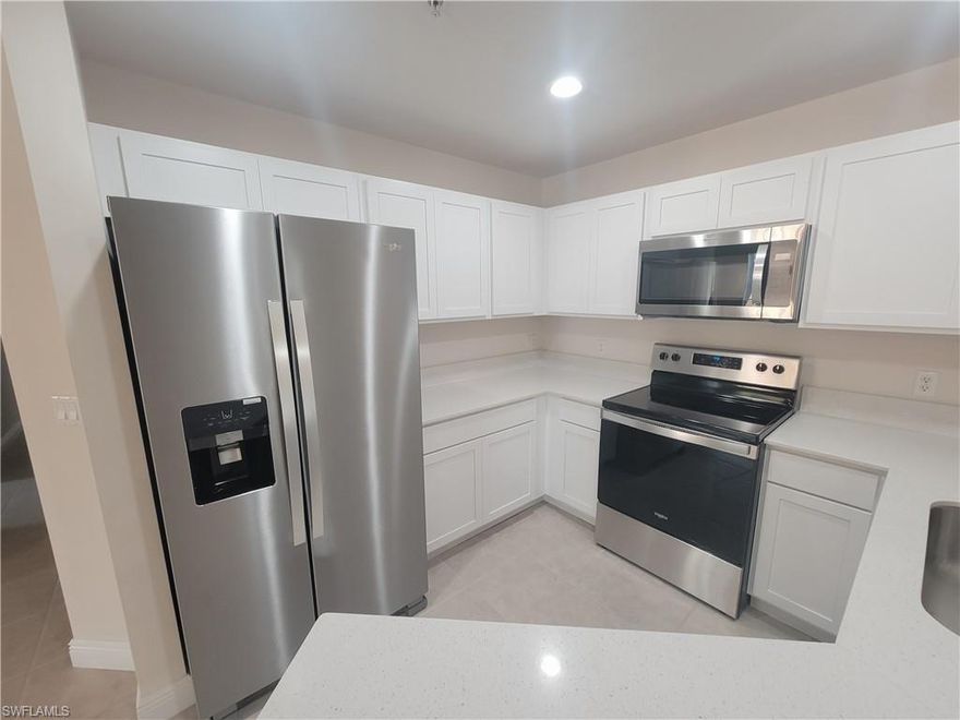 A GREAT VALUE   Wall to wall improvements. New Kitchen Baths Appliances Beautiful Floors   Large Balcony
Elevator to your second floor formal hall entry.  Community center  Pool  Pet park Pickle Ball Barbeque Tiki Huts
This condominium is the size of a single family home, rooms have high ceilings.   Come take a look any time,