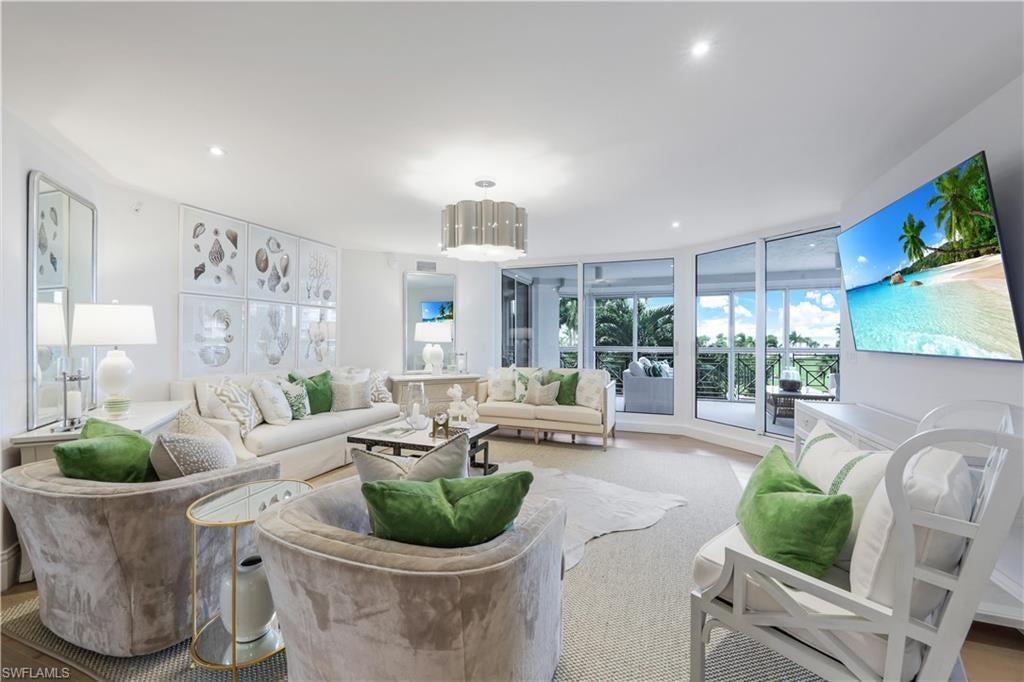 Photo of 4021 Gulf Shore BLVD N #203, NAPLES, FL 34103 (MLS # 223090705)