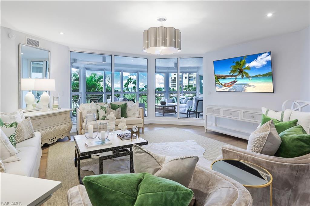 Photo of 4021 Gulf Shore BLVD N #203, NAPLES, FL 34103 (MLS # 223090705)