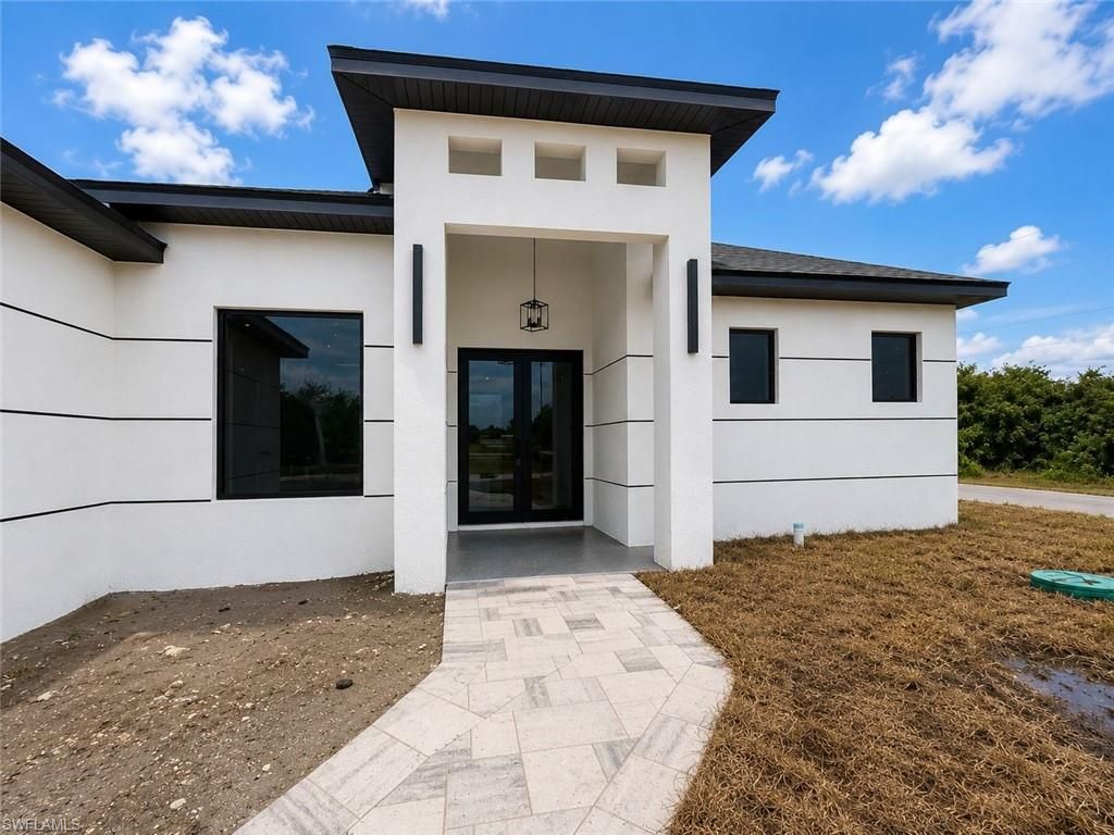 Photo of 921 Martha AVE S, LEHIGH ACRES, FL 33974 (MLS # 226020280)
