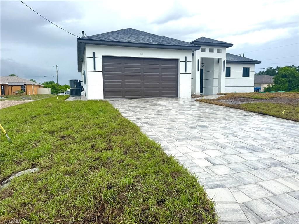Photo of 921 Martha AVE S, LEHIGH ACRES, FL 33974 (MLS # 226020280)