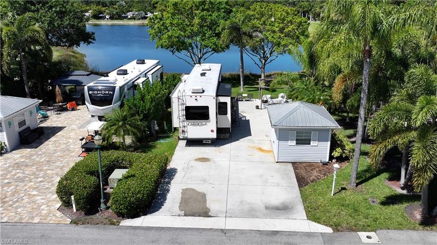Welcome to Lot D58 in Cypress Woods RV Resort, a desirable lakefront property offering over 4,100 square feet of outdoor living space in one of Fort Myers’ premier gated RV communities. This west-facing lot showcases breathtaking sunset views over the water, providing a peaceful and scenic backdrop for relaxing or entertaining.
The property is thoughtfully positioned to maximize privacy, with the accessory building creating a more secluded outdoor living environment. The building is equipped with electric and sits on a solid concrete slab, offering flexibility for storage, workspace, or future customization.

Mature trees provide a natural canopy, delivering comfortable afternoon shade and enhancing the lot’s tranquil, tropical setting. The spacious layout allows ample room for your motorcoach along with outdoor seating and entertainment areas.

This well-located lakefront property offers a unique combination of privacy, shade, and stunning water views, making it ideal for seasonal or full-time resort living. Residents of Cypress Woods enjoy access to resort-style amenities including pools, spas, fitness facilities, and an active social community, all conveniently located near Fort Myers’ beaches, shopping, dining, and entertainment.

Don’t miss this opportunity to own a private, west-facing lakefront lot with exceptional sunset views in Cypress Woods RV Resort.