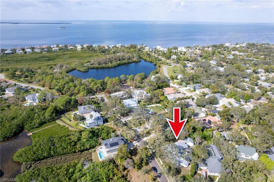 If you're looking for a home near the water, then come step inside this beautiful home in the upscale subdivision of Seaside Sanctuary. This gorgeous, custom home is located in the friendly coastal community of Crystal Beach is directly across the street from Sutherland Bayou, walking distance to the beach, community park, fishing pier & Pinellas Bike Trail. No flood insurance required! This home features a BRAND NEW roof, new flooring throughout the home and many other updates! The home has unique character with tall dormer windows, a wrap- around front porch and old brick driveway. There is an amazing stained glass double front door at the entry. The open floor concept has vaulted ceilings, streaming natural light, 28 ft high brick fireplace, plantation shutters, built in window seats and bookcases. The large country kitchen boasts a center island, an abundance of cabinets, Corian countertops, stainless steel appliances w formal dining room & family room adjacent. The Master bedroom features a double-sided fireplace, skylights, sitting area, walk-in shower for two, jacuzzi tub, separate walk-in closets. Bedrooms two & three offer private bathrooms. The fourth bedroom that can be used as a bedroom or office as it comes off the master bedroom. There are Double French doors that lead to the patio with a pool and waterfall. Don't miss out on an opportunity to call this home YOUR home!