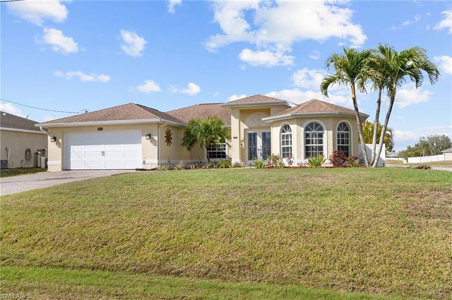 Well maintained 4 bedroom, 2 bathroom home with 1,720 square feet under air in NW Cape Coral near Coral Oaks Golf Course, set on a corner lot with a renovated kitchen and private fenced yard. Buyers searching for a move-in ready home in Northwest Cape Coral near the Trafalgar corridor will appreciate the thoughtful updates, major system improvements, and comfortable living spaces throughout. Inside, tile and bamboo flooring run through the home, creating a clean and low maintenance interior with no carpet. The renovated kitchen features granite countertops and upgraded cabinetry, offering plenty of storage and workspace for everyday cooking or hosting friends and family. Both bathrooms have been updated, and plantation shutters throughout the home add character while allowing flexible light and privacy control.
The outdoor space offers a private setting that is easy to enjoy year round. A fenced backyard provides privacy and space to relax, while the tiled patio creates a great spot for outdoor dining or gathering with guests. The corner lot adds extra breathing room between neighboring homes while maintaining a sense of privacy.
Important updates add peace of mind, including a new roof installed in 2021 and a new AC system in 2025. The home is also pre wired for a generator, an added benefit for storm preparedness in Southwest Florida.
Conveniently located in NW Cape Coral near Coral Oaks Golf Course, the Northwest Softball Complex, Farmer Joe’s grocery market, and the Trafalgar corridor, the property offers easy access to parks, schools, shopping, and everyday conveniences. With major updates already completed and no HOA restrictions, the home offers a move-in ready opportunity to enjoy comfortable living in Northwest Cape Coral.
PID: 08-44-23-C1-04019.0400