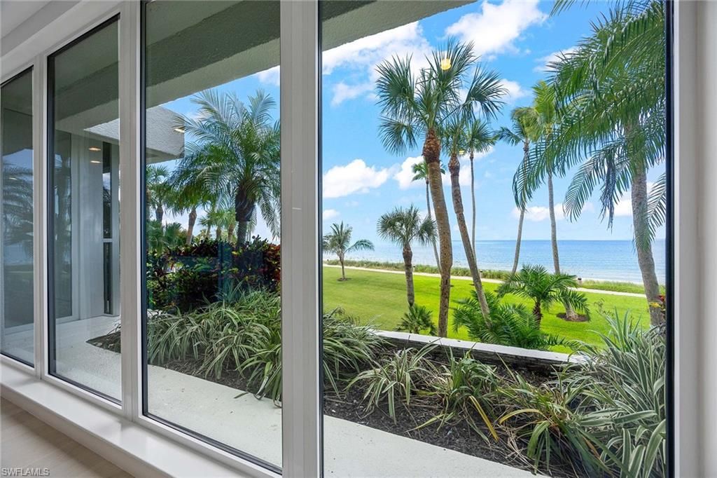 Photo of 4301 Gulf Shore BLVD N #202, NAPLES, FL 34103 (MLS # 225073504)