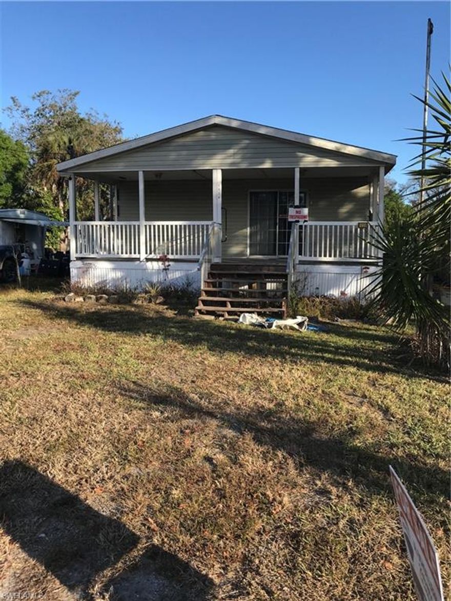 Nice golf cart friendly community in central Glades County on fresh water canal with access to the Caloosahatchee River and Okochobee Water Way. This is a double wide mobile home with 2x6 walls. The home needs some TLC and would be perfect for someone that would like a fixer-upper to fill some of their time. Just off the main road coming into the community. On the main road coming in their is a restaurant which also serves beer and wine. Property backs up to the canal in the rear and has a dock. The bedrooms are nice sized and the home also has a wheelchair ramp for accessibility for handicapped people.