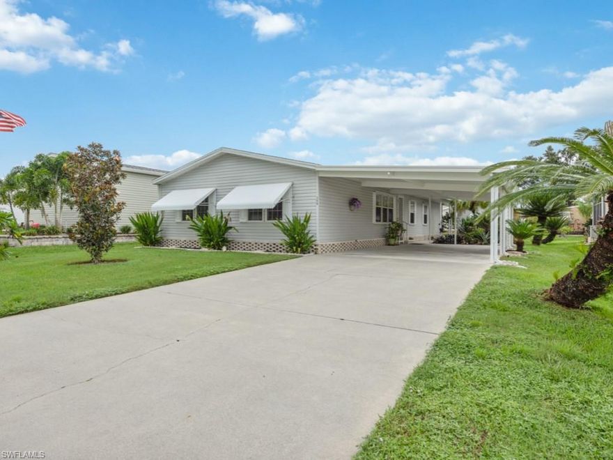 Riverwood Estates is a 55+ waterfront community attached to Rookery Bay Estuary. This community has a boat ramp to encourage boating, kayaking, canoeing, and world-class fishing on  Henderson Creek and beyond. This 2000 Jacobsen-built home provides over 1809 sqft of living space with an additional screened-in lanai and a workshop/storage area. Three bedrooms and two bathrooms. The Primary suite is very spacious, and so is the adjoining bathroom with double vanities and lots of suitable storage cabinets. The guest bedrooms has a natural wood custom desk and queen size Murphy bed. The full-size front-load washer and dryer are inside the home. The driveway has a double carport with room for more than one vehicle. The yard is beautifully landscaped and well-maintained for your outside enjoyment. This kitchen will please any chef with tall natural wood cabinets, updated white appliances, tile backsplash, and an eat-in kitchen. The kitchen is open to the family room and the living room for entertaining—window treatments and 18 x18 inch tile throughout the house.   You own the land, and the HOA fee is only $198.00 a year. In 2017 the shingle roof was installed. Pet friendly too!