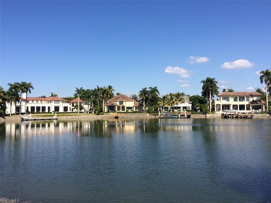 This oversized, cleared lot (.48 Acre) has a wonderful panoramic view across Hidden Bay and you are encouraged to drive by and see how beautiful your home would look on this lot. The virtual rendering of the estate home originally designed for this lot gives you an idea of the size home you can build here with this designed home containing 7,094 sq. ft. of air conditioned living space with 5 bedrooms, den, 6 full baths and 2 half baths, 3-car garage, pool, spa, large lanai with summer kitchen and pool bath. Architectural plans available. Port Royal Club Membership eligibility.