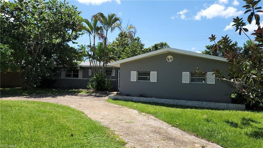 Available 5/16/2026!  This single family is huge and offers 3 bedrooms, 2 baths, 1 car garage with massive living area, bonus living, an extra room to make as a 4 bedroom or office plus additional open area off the bonus living room which would be great for a second office, play room or additional bedroom making this home versatile for any lifestyle!  The main living area has an all-brick wall with decorative fireplace, ceramic flooring throughout the entire house, tons of windows and more.  The yard has matured landscaping with a huge mango for shade, clementine, papaya trees, sugar cane, limes, and completely fenced in for the family pet!  Large pets welcome!!!