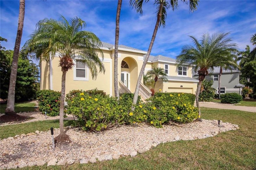 This impeccably maintained traditional style home sits on a quiet stretch of Par View Drive and affords gracious views of the Sanibel River. Located within Beachview Country Club Estates this home offers 3BR/2.5BA, features a split floor plan and is light and bright. Eat-in kitchen opens to a great room with raised ceilings, a wood burning fireplace, and sliding glass doors which open to the deck and oversized heated pool. Neutral flooring featuring wood, tile and carpeting throughout. Impact windows. Shutters for sliding glass doors. New roof in 2023. New Air Handler in 2024. Perfect location is just minutes to the private, deeded beach access. Enjoy the beautiful sunsets from your lanai and pool deck. Two car garage. Enjoy golf at the Sanibel Island Golf Club, tennis at the Beachview Tennis Club, or shelling on our world famous beaches.
