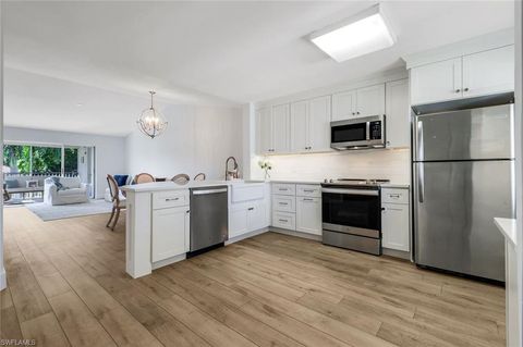 Photo of 7767 Jewel LN #203, NAPLES, FL 34109 (MLS # 225077405)