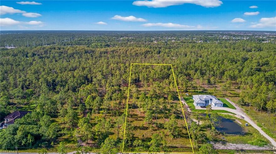 A rare opportunity to own 2.5 acres of pristine land in one of Naples’ most rapidly growing areas. This spacious lot offers peace and privacy, surrounded by mature trees and natural Florida beauty, yet just minutes from everyday necessities. With ample space to design and build your custom dream home or estate, this property provides endless possibilities for outdoor living, gardens, or even room for guest quarters. Ideally located just north of Oil Well Road and west of Everglades Boulevard, this parcel puts you within easy reach of Big Corkscrew Island Regional Park, Winchester Plaza, and the Neighborhood Shoppes at Orange Tree. You’ll also appreciate quick access to Immokalee that connect you to the heart of Naples, stunning Gulf beaches, and all the best that Southwest Florida has to offer. Opportunities like this are becoming increasingly rare in Naples. Don’t miss your chance to secure this beautiful piece of land and create the lifestyle you’ve always envisioned.