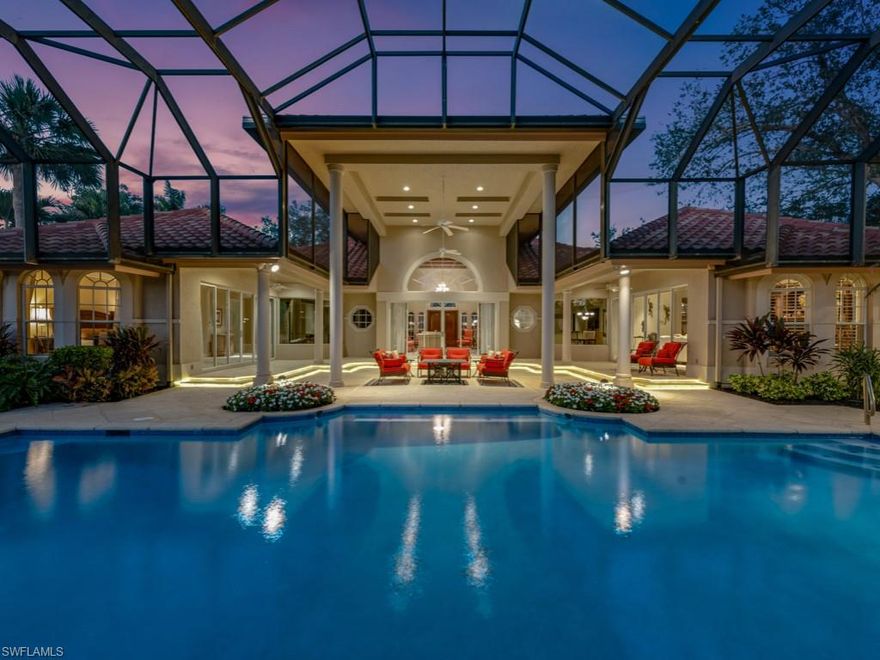 Welcome to your dream home in the highly sought-after Spring Ridge community of Bonita Bay. This stunning estate boasts 5,835 square feet of impeccable living space, featuring 5 spacious bedrooms plus a den, and 5 full bathrooms along with 2 half baths, perfect for families and entertaining guests. As you step into this custom home and into the living room, you are greeted by a volume ceiling and the view out to the resort style pool and lanai.  The travertine flooring creates a serene atmosphere throughout. The expansive great room, adorned with beautiful built-ins seamlessly flows into a lovely kitchen and leisure area, equipped with top-of-the-line appliances including a Sub-Zero refrigerator/freezer, Dacor gas cooktop, Miele double wall oven, and a convenient island with a vegetable sink. The showstopper of this estate home is the breathtaking lanai, complete with captivating water features, a fully equipped outdoor kitchen with built-in grill and bar seating, and spa. Whether you’re lounging by the spacious pool or enjoying the southwestern exposure golf course views of Marsh hole  #10, this outdoor oasis is perfect for relaxation and entertainment. The private cabana, overlooking the pool, offers an ideal retreat for guests or a special hobby space. Additional highlights include a game/movie room, a primary bedroom with direct access to the lanai, and a luxurious primary bathroom featuring dual sinks, a walk-in shower with dual shower heads, and a jetted tub. Equipped with modern conveniences such as a whole house generator, security system, surround sound, plantation shutters, and power-operated drapes. The 3-car air-conditioned garage features an epoxy floor and ample storage cabinets, ensuring functionality meets luxury. With its expansive covered sitting and dining areas, a firepit for cozy evenings, and a pool bath, this home is designed for gracious living. This exceptional property is truly a pleasure to see and the perfect setting for your Florida lifestyle. Don’t miss the opportunity to make this luxurious estate your own! As part of the master-planned Bonita Bay community, you’ll have access to 2,400 acres of beautifully landscaped grounds, a private beach park, and a variety of community parks. Engage in outdoor activities like kayaking and canoeing, or challenge friends to a game of pickleball or tennis. This home is a wonderful opportunity to embrace a relaxed lifestyle in Bonita Bay, surrounded by nature's beauty. Schedule your private tour today!