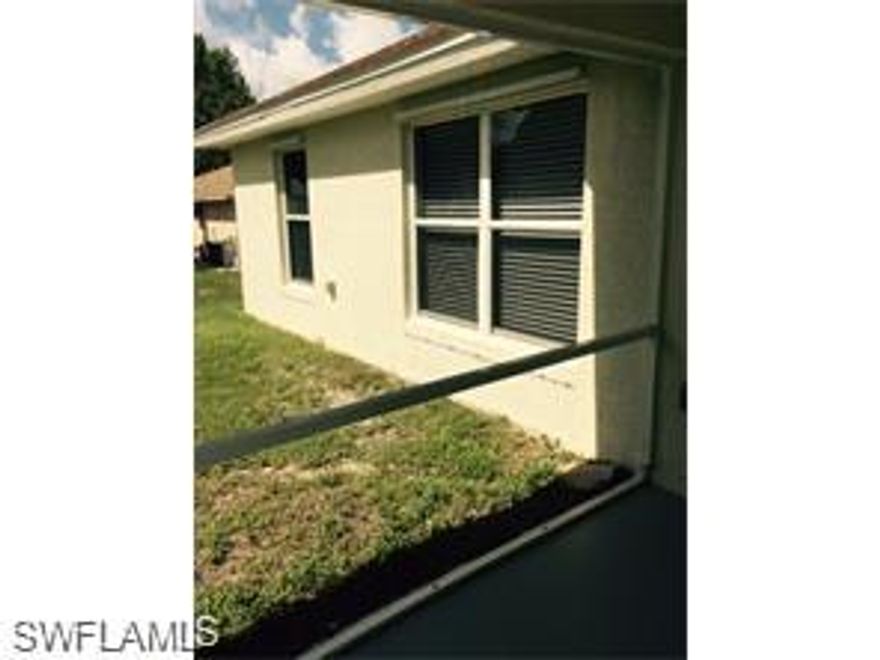 STUNNING VIEW-HOME HAS A FRESH LOOK - MOVE-IN CONDITION. HOME IS ON 1/2 AN ACRE WHICH IS 100% CLEARED, SODDED, AND ALSO IRRIGATED. NEW REFRIGERATOR AND RANGE. CERAMIC TILES THROUGHOUT INCLUDING THE LANAI. GARAGE IS PAINTED,TOO. MASTER BATH HAS WALK-IN  SHOWER and DOUBLE SINKS. HOME IS WELL LIT WITH AN OPEN FLOOR PLAN.  FRENCH DOORS LEAD TO THE DEN-GREAT FOR A HOME OFFICE. REAR LANAI IS SCREENED AND UNDER TRUSS. ENTRY, TOO, UNDER TRUSS AND SCREENED. BEAUTIFUL OAK TREE IN THE BACKYARD. EASY TO SHOW AT SHORT NOTICE AND CAN CLOSE QUICKLY.