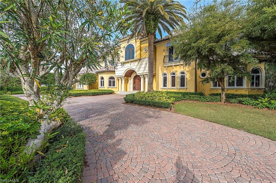 Some homes offer spectacular settings, others gracious interiors. Few have it all, like this splendid estate home on a highly desirable lot and a half in Port Royal with 141 feet of water frontage. Relax outdoors with panoramic views of Galleon Bay and long water views that extend as far as Naples Bay, or lounge in the infinity-edge pool and spa. Entertain in the waterside gazebo with an equipped kitchen or on the multi-terraced pool deck and covered lanai. If you are a boater, you will love the 50-foot dock and 12-ton lift. Once inside, you are greeted by a signature winding staircase in addition to an elevator for convenience, six spacious bedrooms with two master suites and light-splashed library and study. Additional amenities include a state-of-the-art infrared air filter system and immediate eligibility for Port Royal Club membership. This home is a singular value. All it needs is your personal touch.