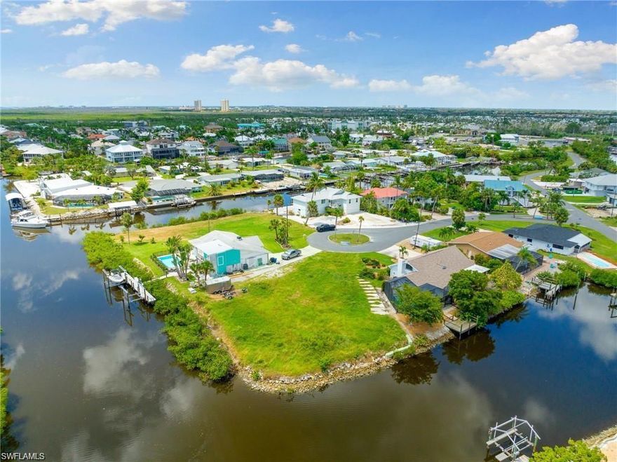 A true boater’s paradise—this oversized waterfront lot on Fort Myers Beach delivers the kind of water access and frontage that’s almost impossible to find today. Perfectly positioned at the end of a quiet cul-de-sac in Tip Top Terrace, the property boasts approximately 180 feet of sweeping canal frontage with direct, no-bridge Gulf access. From your backyard, you can be cruising to the Gulf of Mexico, Sanibel, or Captiva in minutes.

The wide canal setting gives you exceptional space for docking, maneuvering, and accommodating a variety of vessels—an ideal setup for serious boaters who want both convenience and flexibility. Southwest-facing water views set the stage for unforgettable sunset cruises and relaxed evenings by the dock.

You’ll have ample room to design a custom home that celebrates the waterfront lifestyle—think extended docks, outdoor living spaces, and panoramic water views. Close to marinas, waterfront dining, and all the best of island living, this property is built for those who live life on the water.