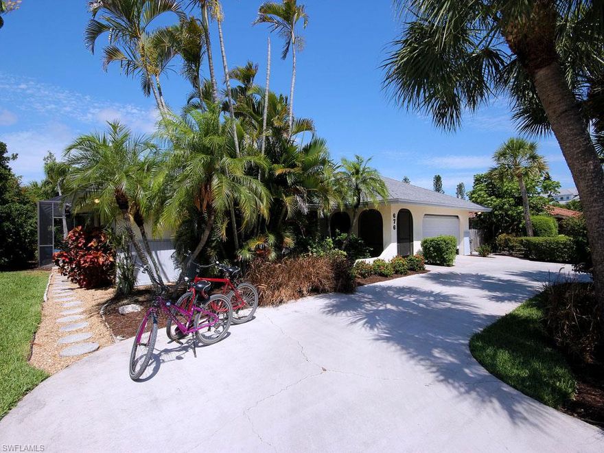 East end Canal w/ Beach access.  Anchor Dr.  Sanibel’s most popular address. Stunning residence sits on oversized lot with circular dr, offering privacy, lovely gardens, palms, dock & prime island location!  3 bedrooms have 3 remodeled baths.  Master bedroom is 26’ x 14.+- Kitchen is fabulous w/Viking appliances, crown molding & custom design. Major rooms have pocket sliders which open to oversized heated pool+  outdoor entertainment areas. Add outdoor space of 1400 sq’ to the 2000 sq’ interior & home lives large! Designer created vibrant living spaces with new Crate and Barrel Furnishings( convey w/sale.) Rented July and Aug with only 1 day to bring Buyers( July 31 ).New rates w/ new kitchen are: $9,000 in season and $6,000 off season.