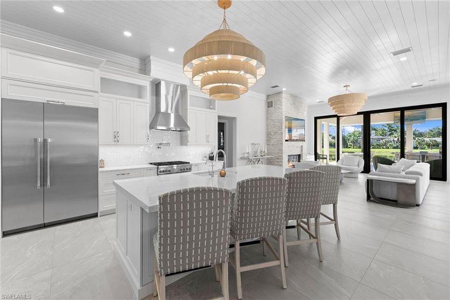 Stunning luxury multi-generational estate in the prestigious Quail West community, this one-of-a-kind residence offers a seldomly found opportunity. Redefining luxury renovation, 6536 Highcroft Drive presents six bedrooms, eight baths and 8,511 square feet of refined living space, set on a lush .82-acre lot. Better than new, this home is completely renovated down to the studs. Like-new-construction updating every square inch from electric and plumbing to the designer light fixtures, become captivated entering into this expansive open floor plan. Breathtaking long water and golf course views provide a tranquil backdrop for the exceptional amenities throughout the totally reimagined space. Avoid delays of building and enter into this meticulously reimagined masterpiece. One’s eyes find unparalleled detail throughout this entire residence from custom handles and knobs in each space, to the unique double-sized trim. A gourmet chef's kitchen featuring built-in gems and ample prep area, ideal for culinary enthusiasts, sits near the similarly outfitted outdoor kitchen. The kitchen seamlessly flows into the inviting great room, ideal for entertaining and relaxation. Enjoy the indoor-outdoor lifestyle with a sprawling lanai ideal for alfresco dining while taking in the serene views. The property also features a private den, multiple home offices, a state-of-the-art fitness center and a spacious casita, offering ultimate privacy for guests. This home features a six-car garage plus two additional parking spaces. Equipped for ultimate peace of mind with a whole-house generator, impact glass throughout and electric hurricane shutters. Enjoy outdoors on your lanai with retractable screens for year-round comfort. Fully furnished with pristine designer furniture, this home exudes sophistication and character at every turn. Whether you’re soaking up the sun in the pool, lounging on the screened-in lanai, coming back from a round of golf at one of Quail West Golf & Country Club’s exclusive two 18-hole courses or retreating to your luxurious primary suite, this home offers unparalleled comfort and style. With just a 20-minute drive to RSW airport, pristine beaches, world-class dining and high-end shopping, this luxury residence offers seclusion and convenience in one of Naples sought-after communities.