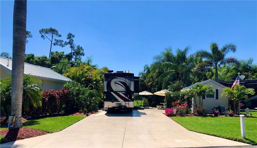 RiverBend Motorcoach Resort RV Lot 230 features exceptional views of Grand Lake fountains and sunsets through a park like common area for the ultimate resort living. The beautiful landscaping is highlighted by numerous palms and arranged for extra privacy. This convenient central location is just a short walk to the pool for quick easy access to numerous amenities. The golf cart and some furniture is included just bring your motorhome! The 10x14 coach house is finished with french doors, kitchenette, refrigerator, extra cabinetry, ceiling fan, A/C and bathroom with shower. This gorgeous Class A Motorcoach Resort is full of friendly people and provides a special sense of community. The resort includes over 1000’ of river frontage on the Caloosahatchee River with boat ramp, slips and trailer/boat storage. Amenities and features include Welcome Center, gated entrance, private high speed fiber optic WiFi internet at each site, 3 clubhouses, restaurant, full bar, billiard room, library, exercise rooms, exercise classes, laundry, R/C Speedway, heated pool, 2 jacuzzis, pickle ball, bocce ball, volleyball, shuffle board, putting green, horseshoes, crafts, games, dog park & more.