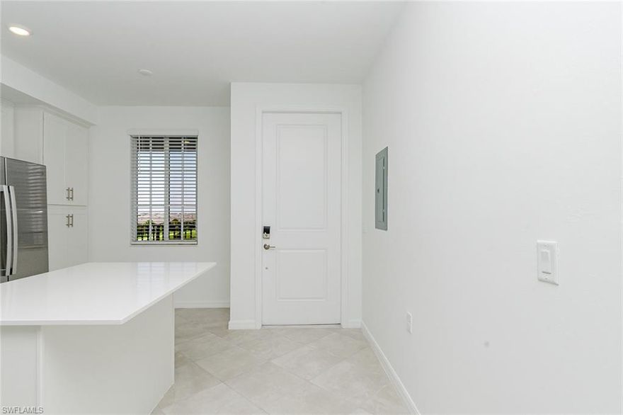 Beautiful Arbor model located in The National Golf & Country Club in Ave Maria. This thoughtfully designed home features an open-concept floor plan with spacious living and dining areas, abundant natural light, and a modern kitchen with ample cabinetry, sleek countertops, and a large island perfect for entertaining. The primary suite offers a private retreat with a walk-in closet and well-appointed bath, while additional bedrooms provide flexible living space. Enjoy outdoor relaxation from the screened lanai. Community amenities include a championship The National Golf Course, resort-style pool, clubhouse, fitness center, tennis courts, pickleball courts, spa services, and scenic walking and biking paths. Resort-style living in one of Southwest Florida’s premier golf communities.