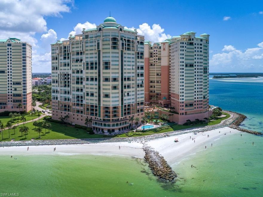Own this Beautiful and Spacious Condo with Unobstructed Coastal Views of the Gulf Coast in Marco Island Florida! Walking through the Foyer you will immediately notice the Level of Attention and Detail put into the Condo's Finishes from the Marble Floors to the Crown Molding. The Living Room and Dining area Showcase the Daily Manicured Beach with Floor to Ceiling Windows. You can Enjoy these Views while having a Refreshment from the Built-in Wet Bar. With a Thoughtfully Laid Out and Functional Kitchen you can Cook and Entertain with No Restraint while Once Again Enjoying the Magnificent Beach Views! Kitchen Features Granite Countertops and Full Appliance Suite. In addition to sitting at the Bar Height Island Counter, you can Bask in the Sun in the Corner Breakfast Nook. The Massive Lanai is Accessible through the Kitchen, Living Room and the Master Bedroom- providing Ample Space for Everyone to Enjoy the Magnificent Sunsets! The En Suite Master Bath is complete with a Jacuzzi Tub and Glass Enclosed Shower. This condo Comes Fully Furnished and the Price Includes a Reserved Garage Space.