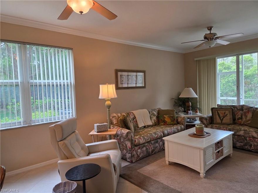 1st floor End unit, Cornell floor plan garden home in Legends golf & country club with a Social membership. This is a big 2 bedroom + den END unit with a one car garage and is being sold turn key furnished. Great location next to the swimming pool and offers a very peaceful view of the preserve. The building has just been freshly painted, the roof was new in 2025 and the building has hurricane impact windows and doors. Big tile throughout, crown molding, lots of windows and much more. With a social membership included in this price you enjoy living in a gated community, grand slam tennis, pickle ball, bocce ball, 3 restaurants with fine & casual dining, a state of the art fitness center, tons of social activities, cable TV, internet services and much more. This corner condo has lots of windows and features are solid surface counters, big 20 tile on the diagonal, crown molding, hurricane rated windows just to name a few items.