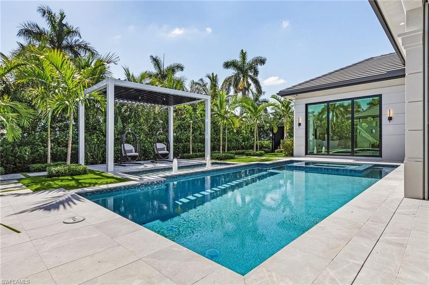 Borelli Construction of Naples, Park Shore's premier luxury builder, has just completed their newest contemporary home situated on a large corner lot.