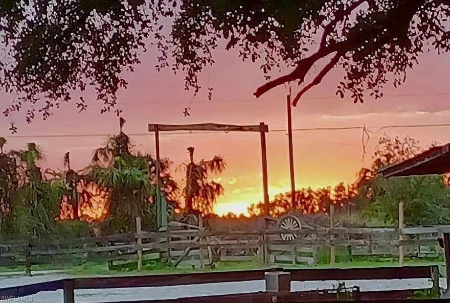 10-level acres of horse property situated in Alva, Lee County, on beautiful Bedman’s Creek. A mix of open pasture, lush oak hammock, fruit trees, and beautiful tropical foliage in SW Florida. Refuge for many indigenous plant and animal species! Alva is recognized as a premier location for horses here in Florida, with the Caloosahatchee River for boating, fishing, and jet skiing, with nearby county parklands to hike and enjoy.
Center aisle horse barn, seven stalls, tack-feed room, power, water, and hay storage area. Storage building with overhang for equipment cover, horse run in shed located in rear paddock.
Plenty of pasture and turn out on ten acres of land, mature old oak trees for shade, and a beautiful, clear-running creek runs through the property. Dead-end road from Joel Blvd., minutes to shopping and dining. Tractor Supply and other horse services are nearby with plenty of horsey neighbors in this equestrian-friendly community of Alva.
Property is offered As Is with the right to inspect, CASH sale only considered, proof of funds required. Twenty-four-hour notice to show, horses and pets on premises. Do NOT drive onto property without an appointment.
House needs some work and remodeling, call for details, lots of potential, and can be lived in and make a great camp, retreat, or build NEW on the land here while enjoying your horses, storing equipment, work vehicles, RV, boats, and four-wheelers, etc.