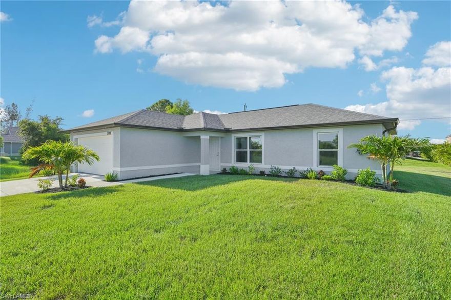 This 3-bedroom, 2-bathroom home with a 2-car garage in Cape Coral is ready for immediate occupancy. Features include beautiful stone countertops, stainless steel appliances, floor-to-ceiling tile in the bathrooms, and stylish LVT and tile flooring—no carpet. The home comes with a 1-year builder warranty and a 10-year structural warranty. Flood insurance is not required due to the home's elevated construction above FEMA's flood plain, with official reports available for buyers at closing. Schedule a showing now! Photos and renderings are for display purposes only.
