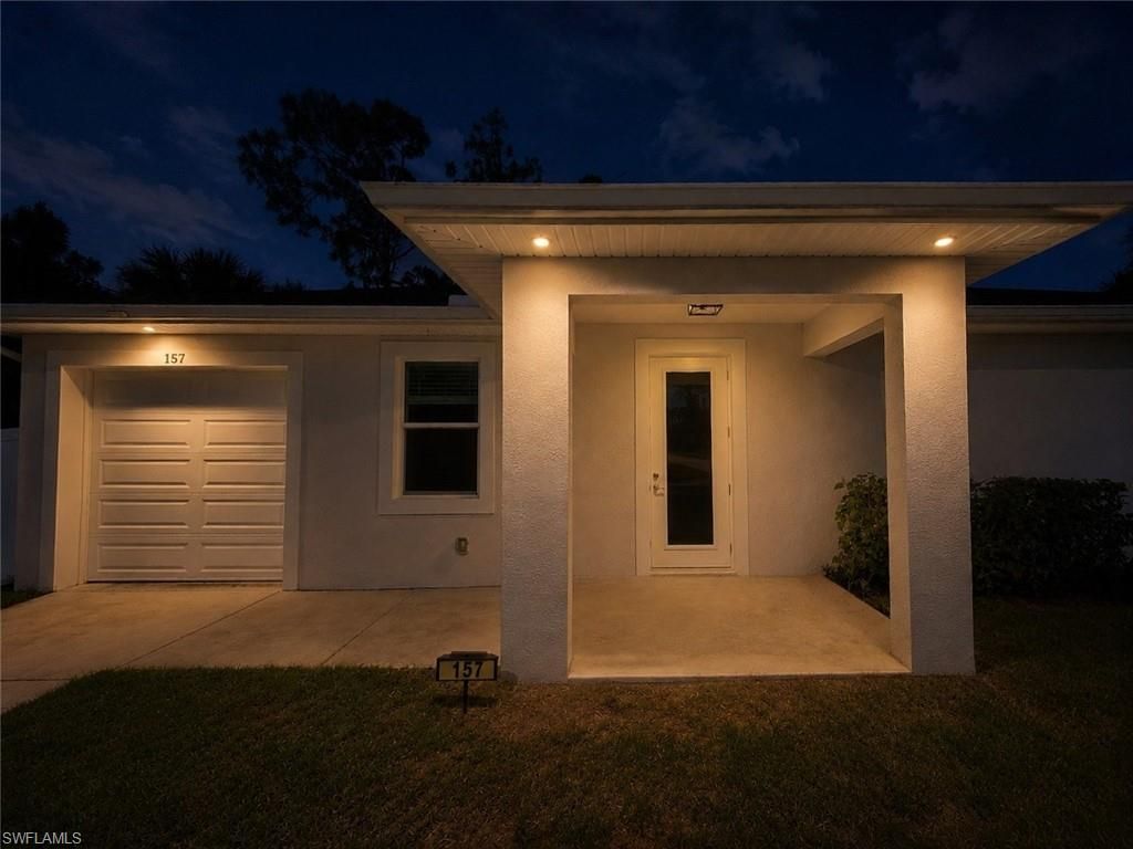 Photo of 157 Karlow AVE S, LEHIGH ACRES, FL 33974 (MLS # 226018973)
