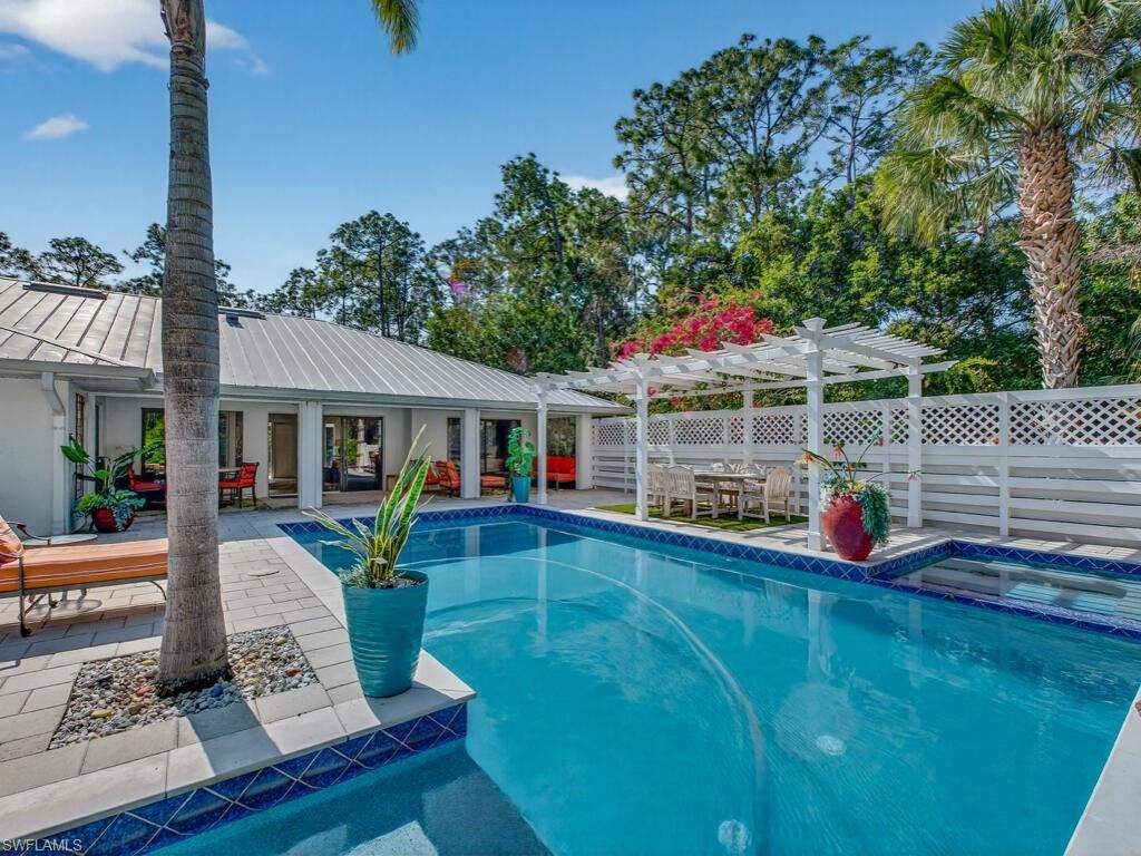 Photo of 3331 3rd AVE NW, NAPLES, FL 34120 (MLS # 226017842)
