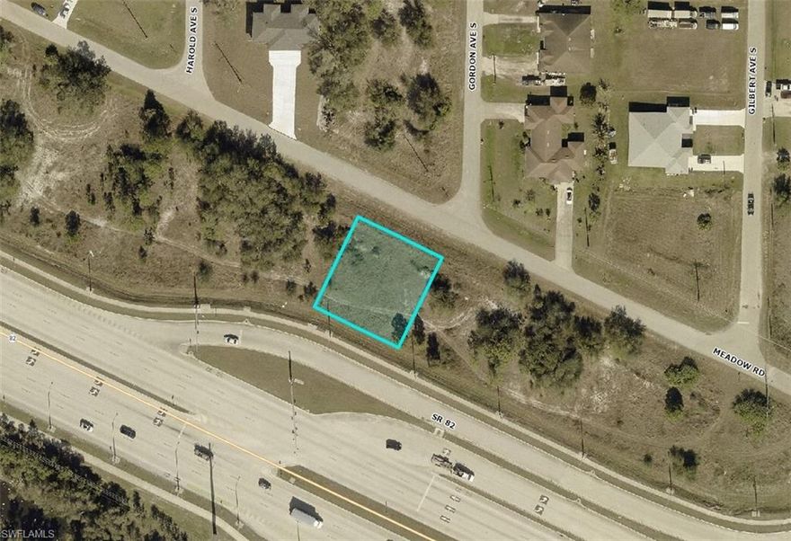 **DUPLEX ZONED LOT** Zoned C2 so could also be a developed into a COMMERCIAL building/use. C2 allows for a duplex to be built. This PREMIUM (.2434 acres) duplex lot sits in an extremely sought after part of Lehigh Acres, bordering Fort Myers! Right next to both Gunnery Rd S & SR82 makes ease of access to everything the area has to offer seamless. Lot is 99% cleared off, so already a savings of several thousand compared to those will trees. Not far to grocery stores, schools and other amenities. - Major airport just a quick drive away (RSW Southwest International Airport), as well as other adventures to explore: Fort Myers Beach, JetBlue Stadium (Home of the Red Sox spring training), Hammond Stadium (Home of the Twins spring training).
