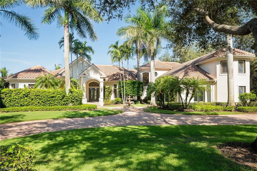 Located in the exclusive Bellflower estate community in award-winning Grey Oaks Country Club, this elegant custom home is westerly with exceptional private and wide golf fairway views to the newly renovated championship Pine Course. Well-appointed and gracious, the home was designed for personal relaxation and entertainment. The spacious primary bedroom suite features a sitting area, slider access to the lanai and two custom walk-in closets. The main floor guest wing has two en-suite bedrooms with one accessing the lanai. Sunny and well-appointed, the kitchen and great room enjoy access to the lanai which is perfect for entertaining, oversized with a fireplace and summer kitchen. There is a custom built-in wet bar in the living room. The second floor has three bedrooms, two en suite, a commanding office and den in addition to the one on the main floor, refreshment area and patio access. Grey Oaks is an award-winning club with fabulous amenities, including three golf courses, a 30,000-square-foot wellness center, active tennis and pickleball, fitness and social programs. Old Naples, fine dining, the beaches, and international and private airports are easily accessible.