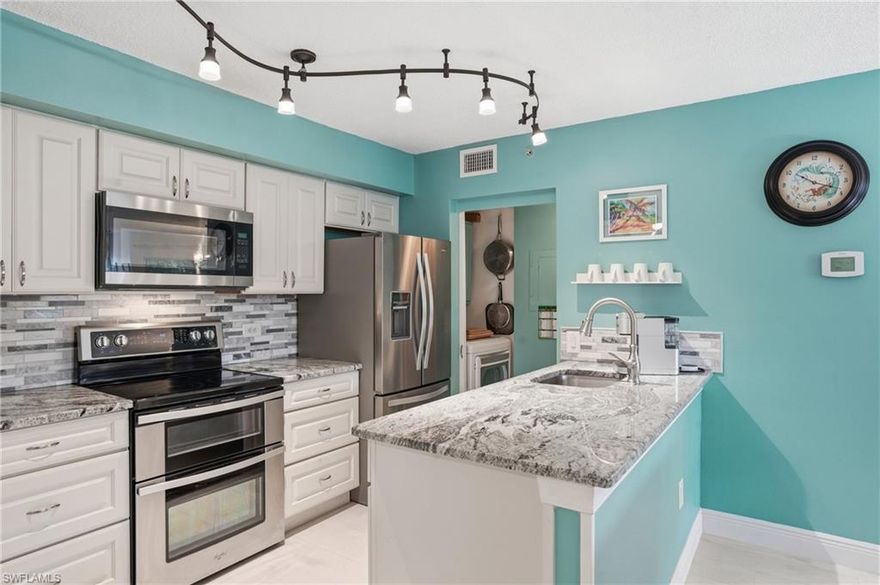 Your tropical retreat awaits! This beautiful unit has been completely updated and designed for maximum comfort. The entry closet has been converted to a kitchen pantry, for your storage needs. Purposely painted in soft, relaxing hues, the atmosphere will make you feel like you are on permanent vacation. BOTH bedrooms are en suite, with their own bathroom, so this unit basically has TWO primary suites! The pool, tennis courts, and all other amenities are located just a few steps away! San Mirage is in one of the BEST locations in SW Florida. Just off US 41, in central Bonita Springs. This community has all the amenities you need to live your best SW Florida lifestyle!