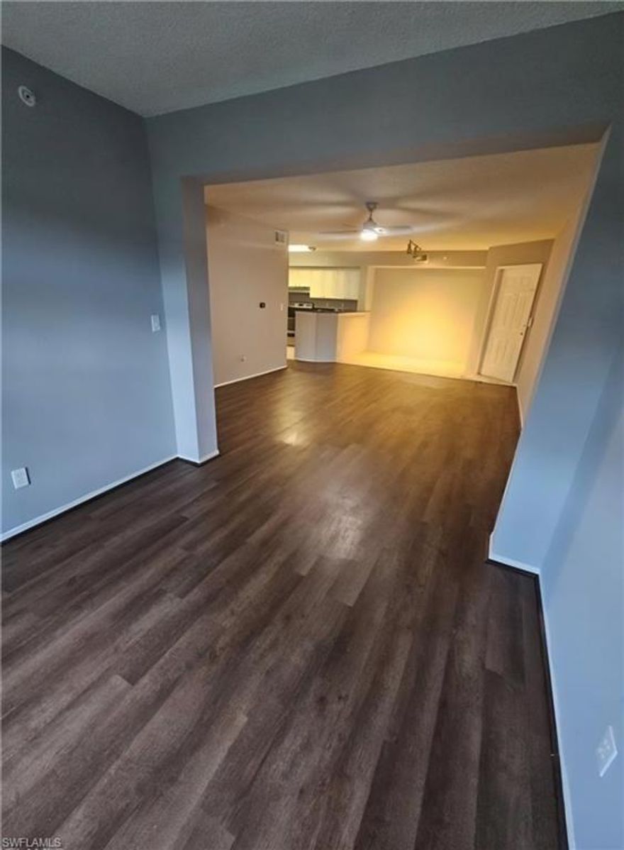 Welcome to 8265 Ibis Club Drive #610 in the highly desirable zone of Berkshire Lakes Radio Rd in Naples, just 7 miles to the white sand beaches and moments to shopping, dining, and downtown excitement. Perfectly positioned in a gated community, this first floor lakefront residence offers the ideal blend of value, location, and lifestyle.

This light, bright, happy unit features peaceful western exposure over the lake, delivering beautiful sunset views and sparkling water scenery right from your living room. As a first floor end unit, you will enjoy easy access, added privacy, and extra natural light that enhances the open living and dining layout. With 811 square feet under air, the well designed floor plan includes one bedroom plus a versatile den, ideal for a home office, guest space, or creative retreat. The kitchen offers a pantry and functional workspace, while the spacious primary suite features a walk in closet and a full bath with tub and shower combination. Laundry is conveniently located inside the residence.

One of the most compelling features of this property is the incredibly low condo fee of just $315 dollars per month (WOW), clearly the lowest of any condo community in Southwest Florida. The fee includes water and sewer, trash, and full access to community amenities, providing exceptional value and a truly low maintenance lifestyle.

Residents of Ibis Club International enjoy a community pool, clubhouse, exercise room, and BBQ and picnic areas, all within a secure gated setting. Whether you are seeking a primary residence, seasonal getaway, or smart investment with leasing allowed up to three times per year, this lake view condo offers an outstanding opportunity in one of Naples’ most convenient locations.