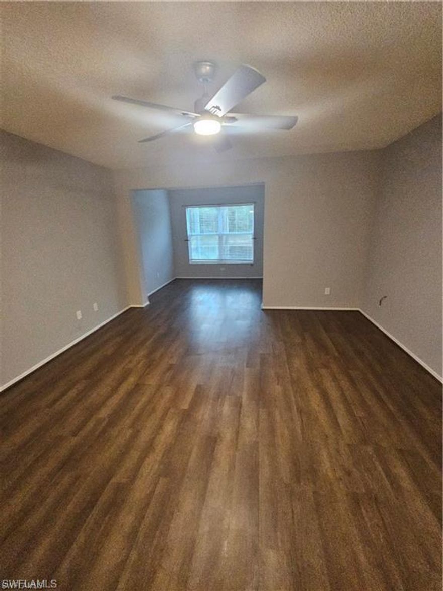 Welcome to 8265 Ibis Club Drive #610 in the highly desirable zone of Berkshire Lakes Radio Rd in Naples, just 7 miles to the white sand beaches and moments to shopping, dining, and downtown excitement. Perfectly positioned in a gated community, this first floor lakefront residence offers the ideal blend of value, location, and lifestyle.

This light, bright, happy unit features peaceful western exposure over the lake, delivering beautiful sunset views and sparkling water scenery right from your living room. As a first floor end unit, you will enjoy easy access, added privacy, and extra natural light that enhances the open living and dining layout. With 811 square feet under air, the well designed floor plan includes one bedroom plus a versatile den, ideal for a home office, guest space, or creative retreat. The kitchen offers a pantry and functional workspace, while the spacious primary suite features a walk in closet and a full bath with tub and shower combination. Laundry is conveniently located inside the residence.

One of the most compelling features of this property is the incredibly low condo fee of just $315 dollars per month (WOW), clearly the lowest of any condo community in Southwest Florida. The fee includes water and sewer, trash, and full access to community amenities, providing exceptional value and a truly low maintenance lifestyle.

Residents of Ibis Club International enjoy a community pool, clubhouse, exercise room, and BBQ and picnic areas, all within a secure gated setting. Whether you are seeking a primary residence, seasonal getaway, or smart investment with leasing allowed up to three times per year, this lake view condo offers an outstanding opportunity in one of Naples’ most convenient locations.