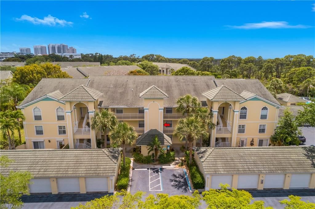 Photo of 15475 Cedarwood LN #203, NAPLES, FL 34110 (MLS # 226015083)