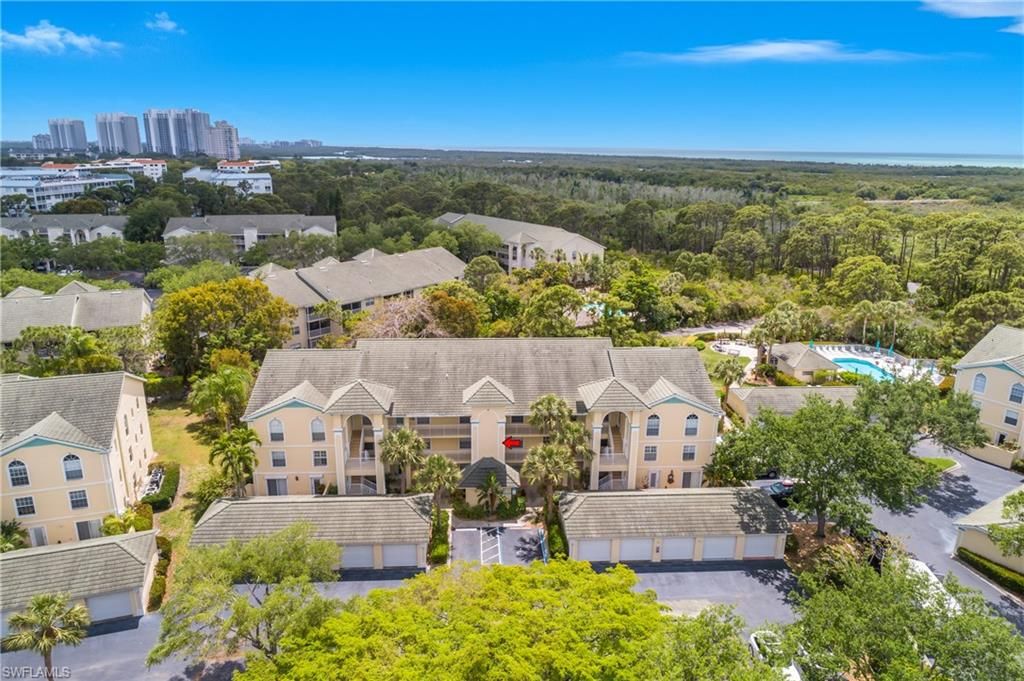 Photo of 15475 Cedarwood LN #203, NAPLES, FL 34110 (MLS # 226015083)