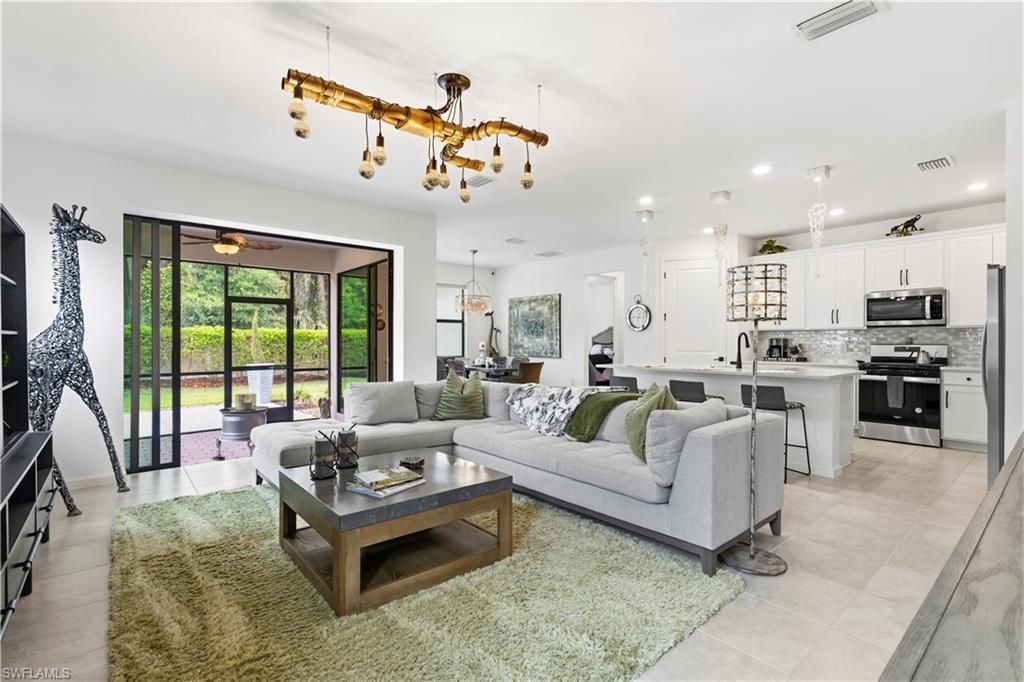 Photo of 10475 Ventana LN, NAPLES, FL 34120 (MLS # 226014940)