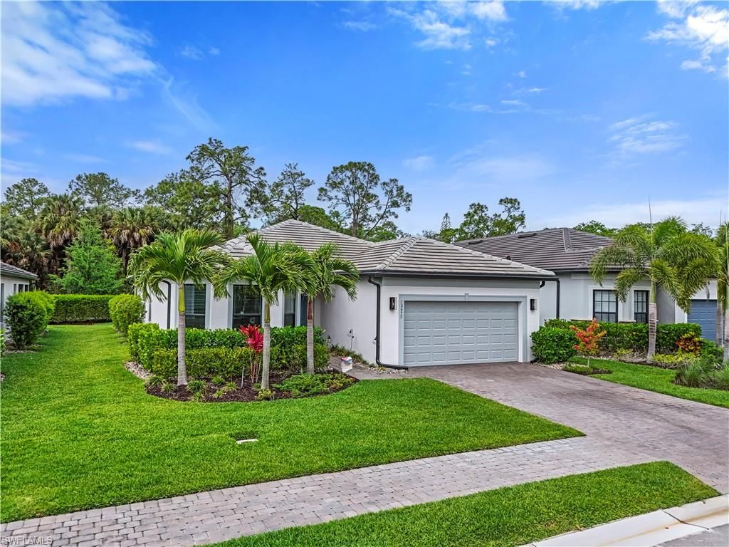 Photo of 10475 Ventana LN, NAPLES, FL 34120 (MLS # 226014940)