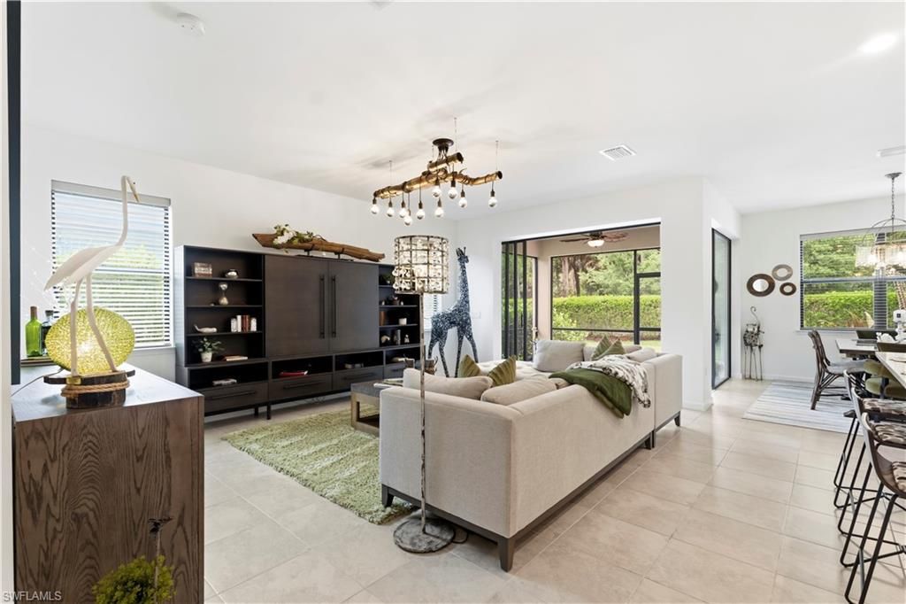 Photo of 10475 Ventana LN, NAPLES, FL 34120 (MLS # 226014940)