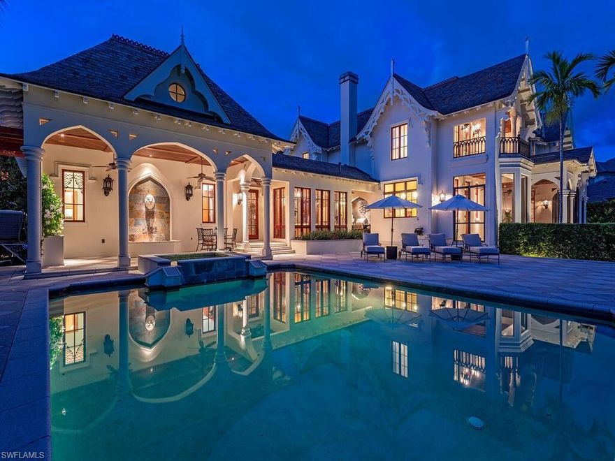 A love story between historic beauty and coastal elegance, entwined on a lush half-acre in the heart of Aqualane Shores, this extraordinary residence is a rare and radiant expression of architectural romance. Carefully curated and masterfully constructed, the home is a celebration of artistry — where restored cathedral relics, monumental design elements, and bespoke craftsmanship come together in a space that feels at once timeless and deeply intimate. 

From soaring arched ceilings, to intricately carved stone details and hand-finished woodwork, every surface tells a story — one shaped by reverence for history and a love of fine detail. Elements sourced from centuries-old churches have been reimagined and thoughtfully placed, bringing a quiet grandeur and sacred beauty to everyday living.

The home offers four luxurious bedrooms, each designed as a private retreat, a richly appointed study, and a large loft/game room for moments of play and connection. Sunlight pours through dramatic windows, casting warm light across rich textures and custom finishes that invite both admiration and touch.

Outside, a private boat dock with lift extends your living space onto the water, offering direct access to the Gulf and endless opportunities to explore the natural beauty that surrounds. Lush landscaping creates a sense of seclusion, while the home’s commanding presence remains soft, elegant, and welcoming.

Every nook, corner, and crevice has been finished with intention, shaped by artisans and guided by a vision of lasting beauty. This is not just a home, it’s a place that stirs the soul, a dwelling that reflects both passion and peace. Aqualane Shores is known for its prestige, but this home stands apart from the rest. It is rare, romantic and unforgettable.