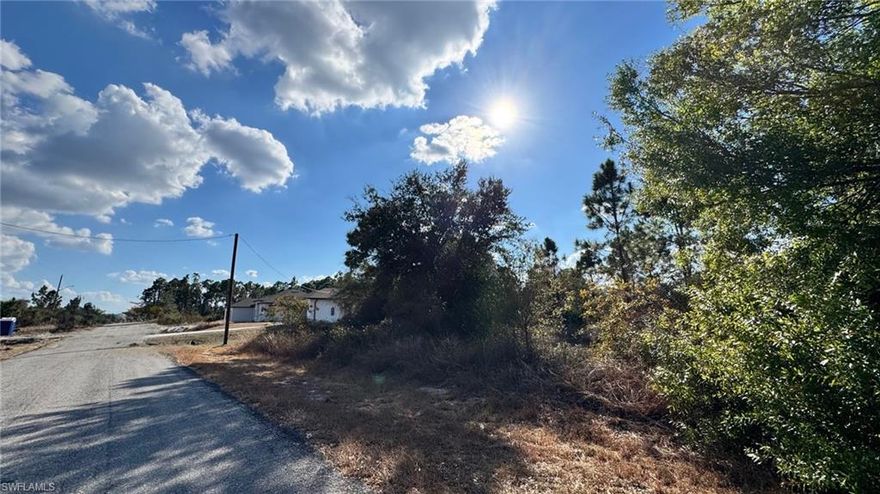 Build your dream home on this spacious 0.50-acre residential lot in the growing community of Lehigh Acres. Located in a peaceful neighborhood with easy access to main roads, schools, shopping, dining, and parks. This oversized parcel offers plenty of room for a custom home, pool, and outdoor living area. No HOA—ideal for homeowners or investors alike. Enjoy the privacy and flexibility while still being conveniently located near Fort Myers, Southwest Florida International Airport, and Gulf Coast beaches. Excellent opportunity to own land in one of Southwest Florida’s fastest-growing areas. BRAND NEW HOMES ALREADY BUILT ON THE SAME BLOCK.