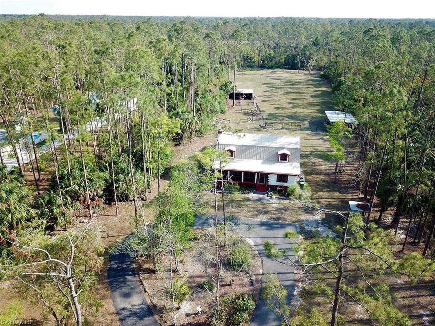 H.12922 - Old Florida meets the Carolina mountains!  Privacy abounds in this rare and authentic log cabin home nestled on 2.5 acres located just minutes from I-75 and only 10 miles to the best beaches in SWFL!  Bring your horses or ATVs, as the lot is fenced in and mostly cleared.  Priced to sell, this 2000+sf home in a most desirable area won't last long!