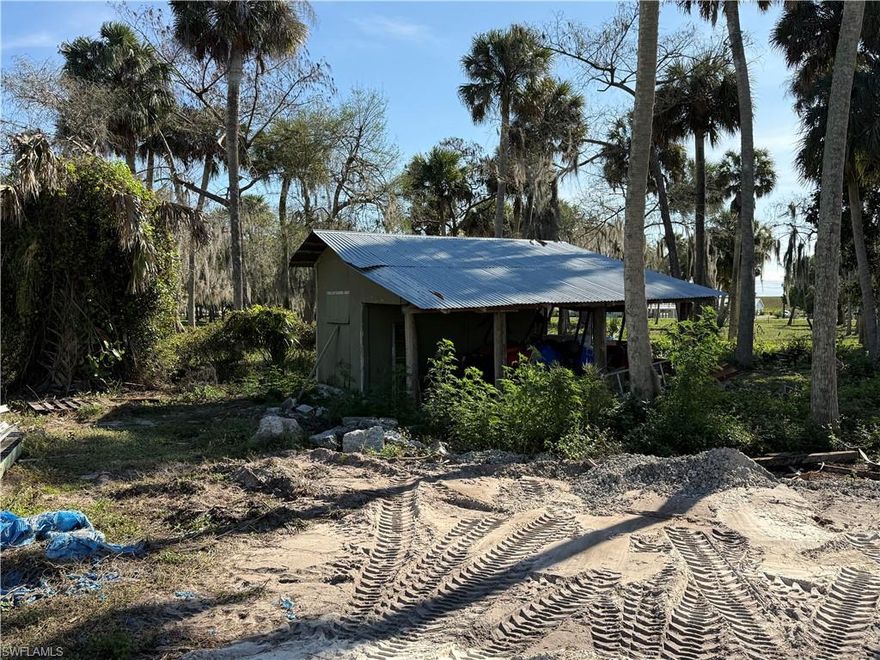 RARE OPPORTUNITY…. Over 1/2 acre with improvements in the heart of Lakeport! Property previously had 2 mobile homes with 2 septic systems. Now under 1 property ID but lot may be able to be once again divided with a lot split application approval through Glades Co. Community Development or build a home site with a building for all your boats, fishing supplies and hobbies. 250 ft of paved road frontage in the heart of LakePort. Close to the bait shop and within minutes of the public boat ramp. Seller will be conveying with sale additional improvements to include a small storage building and shed. Utilities are on site from previous homes, one septic is considered abandoned and the other may be usable. Please see realtor remarks for additional disclosures. Property being sold in “AS IS” condition. Owner will remove personal items before closing.