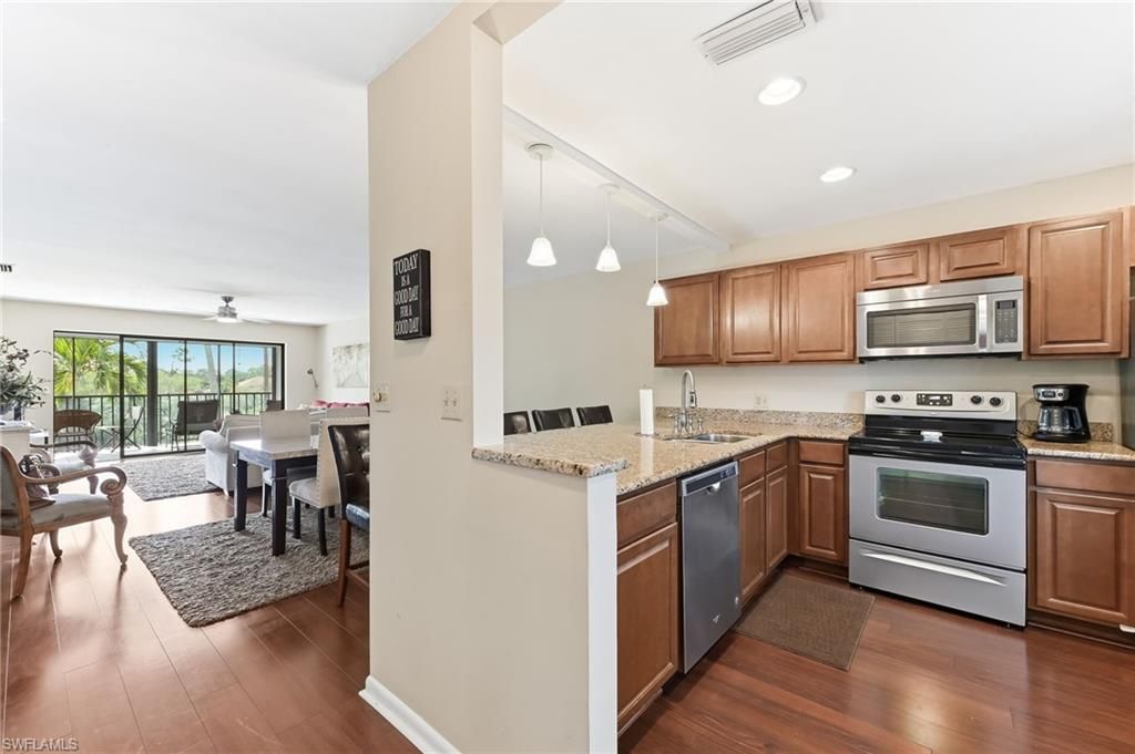 Photo of 5725 Gage LN #E301, NAPLES, FL 34113 (MLS # 226009037)