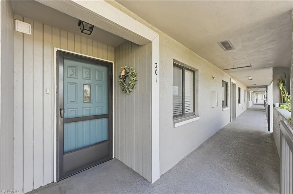 Photo of 5725 Gage LN #E301, NAPLES, FL 34113 (MLS # 226009037)