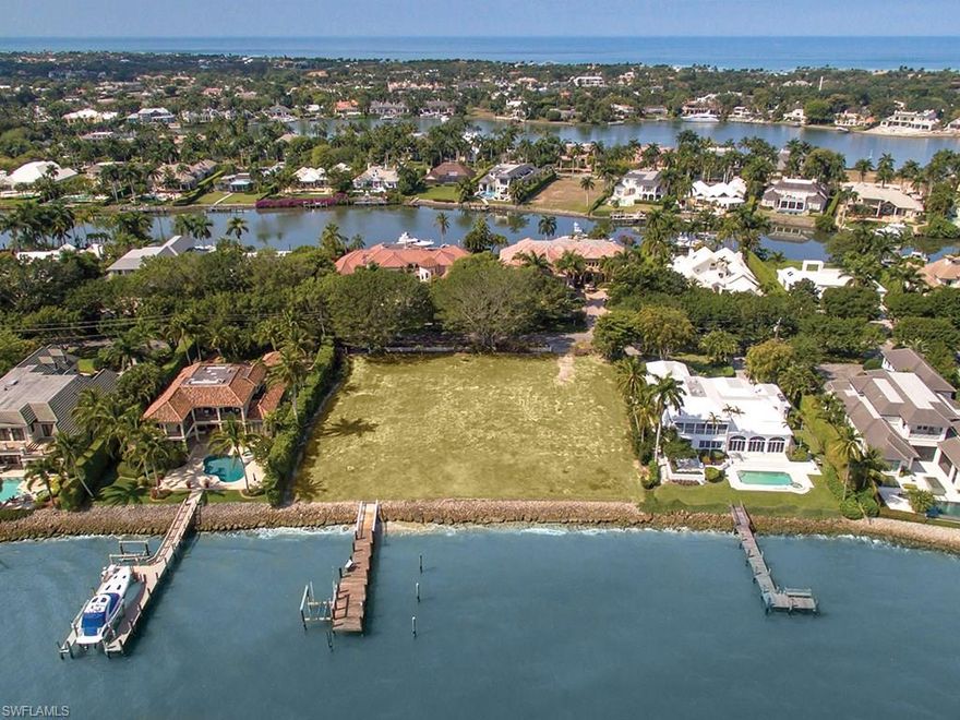 Exquisite and rare two estate lots with 192' of water frontage overlooking Naples Bay with no bridge access to the Gulf of Mexico.   One of the most desired wide water views with room for a significant yacht.  This is one of the very best building sites in all of Port Royal !